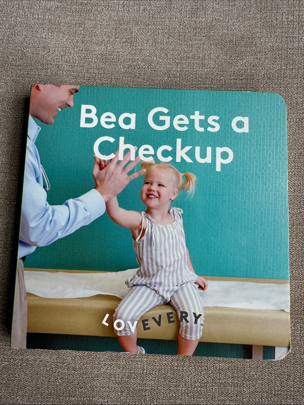 Lovevery Bea Gets a Checkup Board Book - Teal